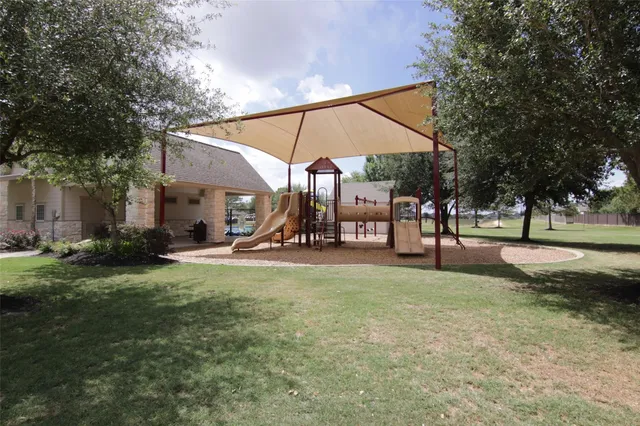 a view of a park with sitting area