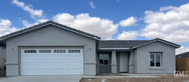 a view of a house with a garage and a garage