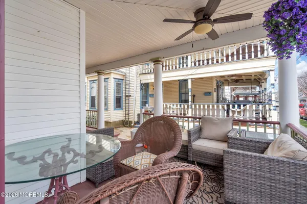 a view of a porch with furniture
