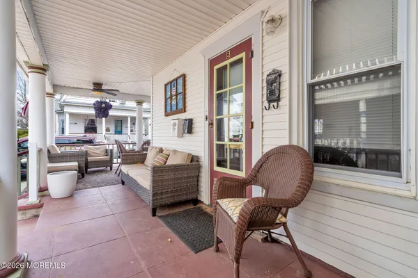 a view of a porch with furniture