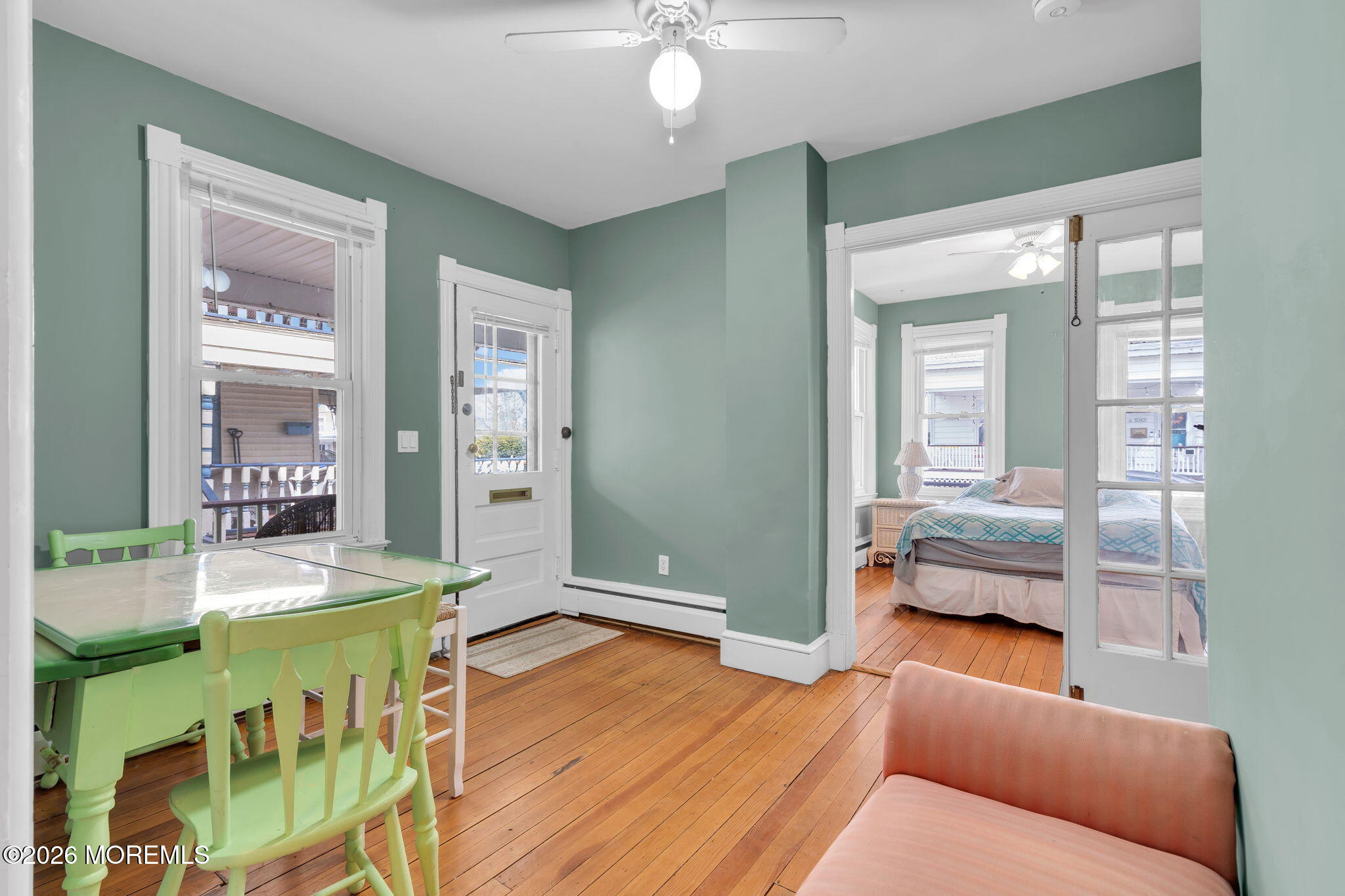110 Mt Tabor Way, Unit B Ocean Grove, NJ 07756 - Photo 5 of 17 a bedroom with furniture and a wooden floor