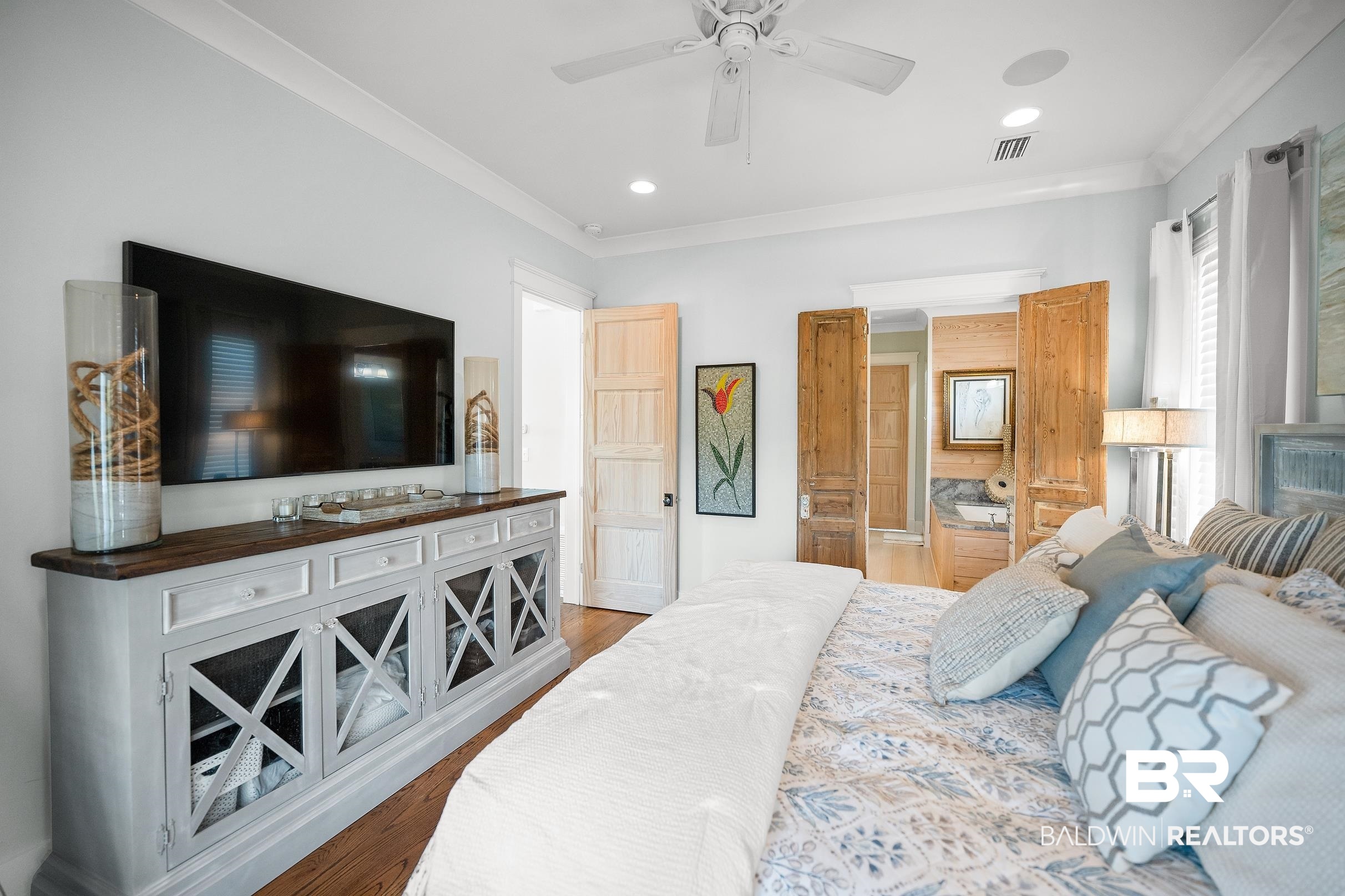 33186 Marlin Key Drive Orange Beach, AL 36561 - Photo 49 of 87 Bedroom featuring crown molding, light wood-type flooring, ensuite bathroom, a ceiling fan, and recessed lighting