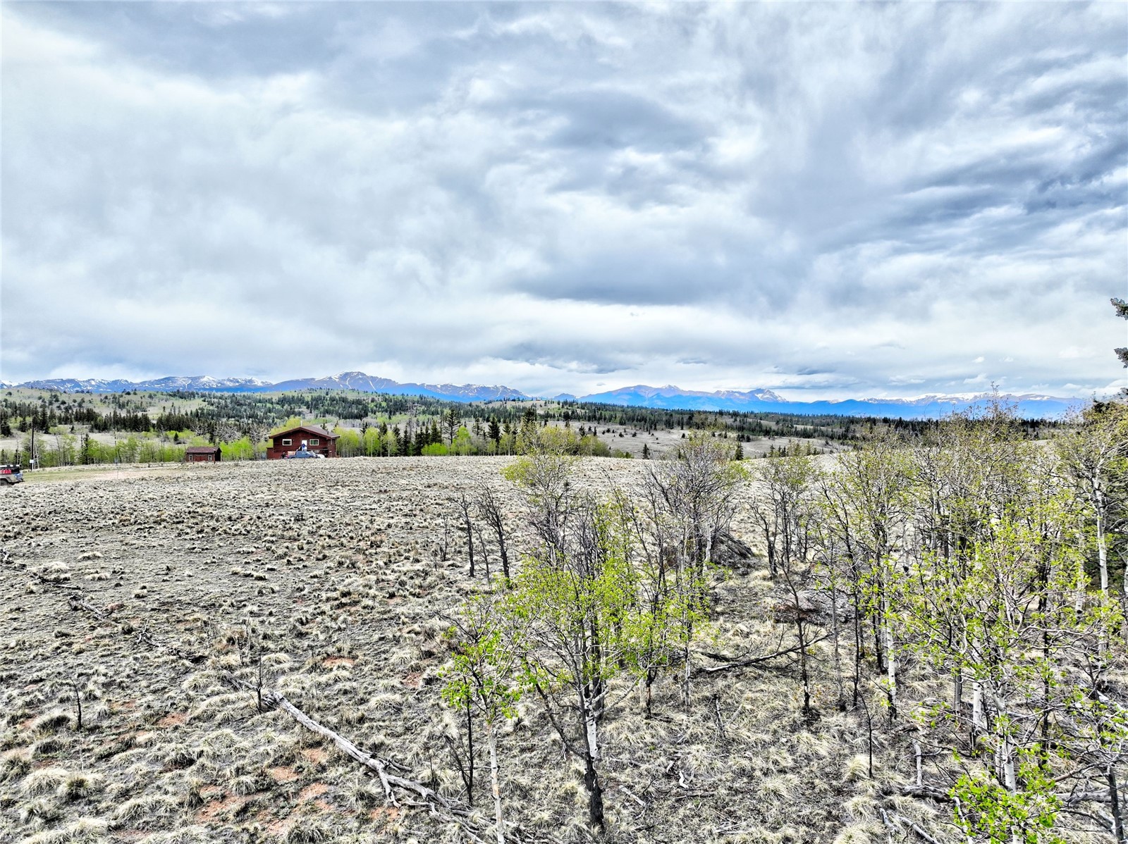 71 Mallard Road Como, CO 80432 - Photo 5 of 16 a view of a lake with houses in the back