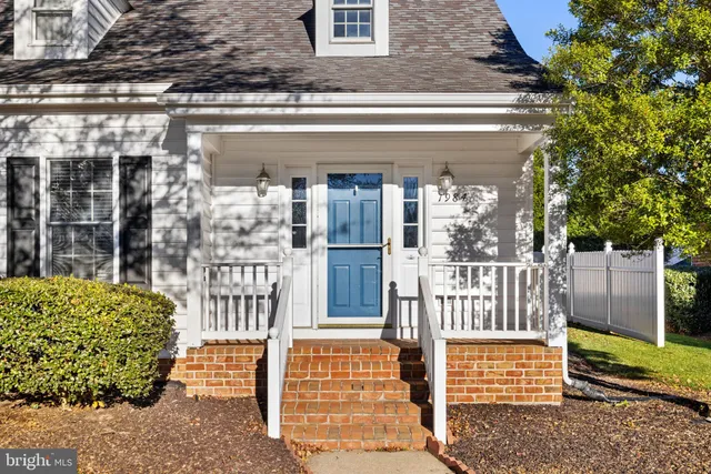 front view of a house with a large window