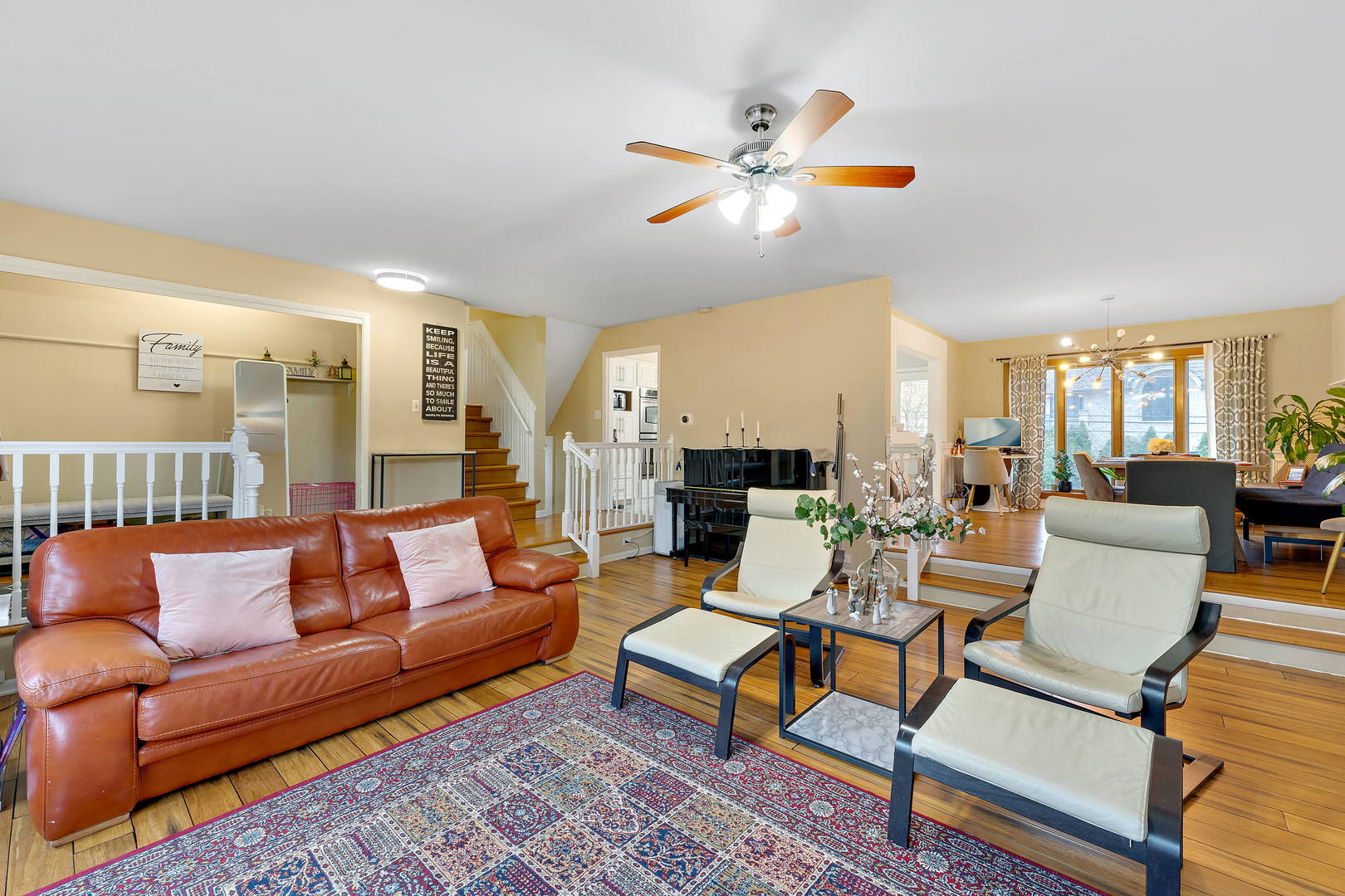 1527 Sunset Ridge Road Glenview, IL 60025 - Photo 2 of 20 a living room with furniture and a chandelier