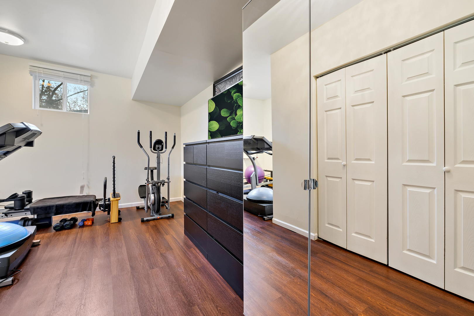 1527 Sunset Ridge Road Glenview, IL 60025 - Photo 17 of 20 a view of a workspace with wooden floor and furniture