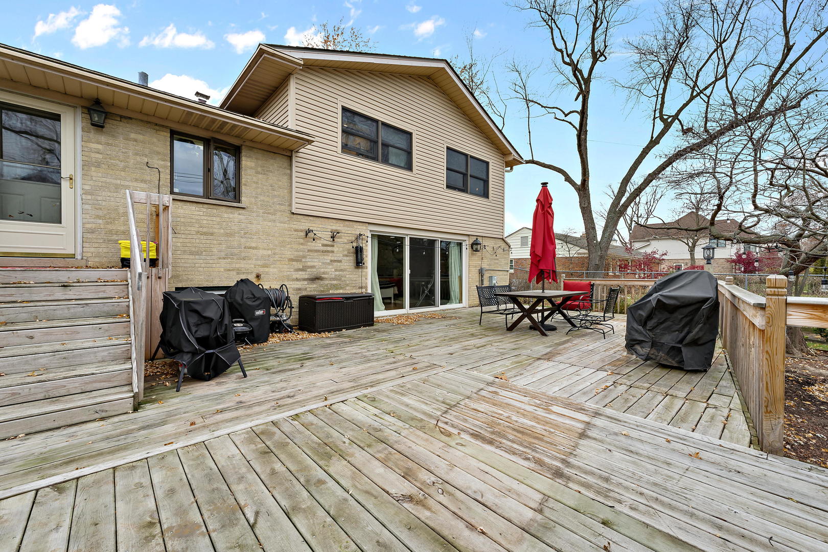1527 Sunset Ridge Road Glenview, IL 60025 - Photo 18 of 20 a view of a house with a patio
