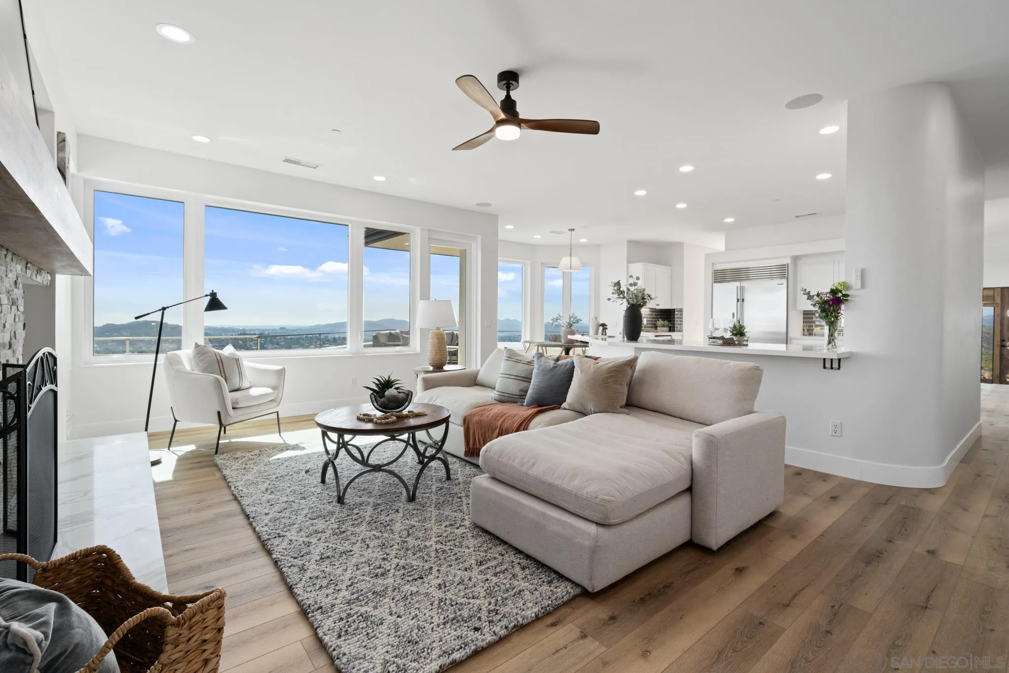 15486 Markar Road Poway, CA 92064 - Photo 11 of 63 a living room with furniture and kitchen view