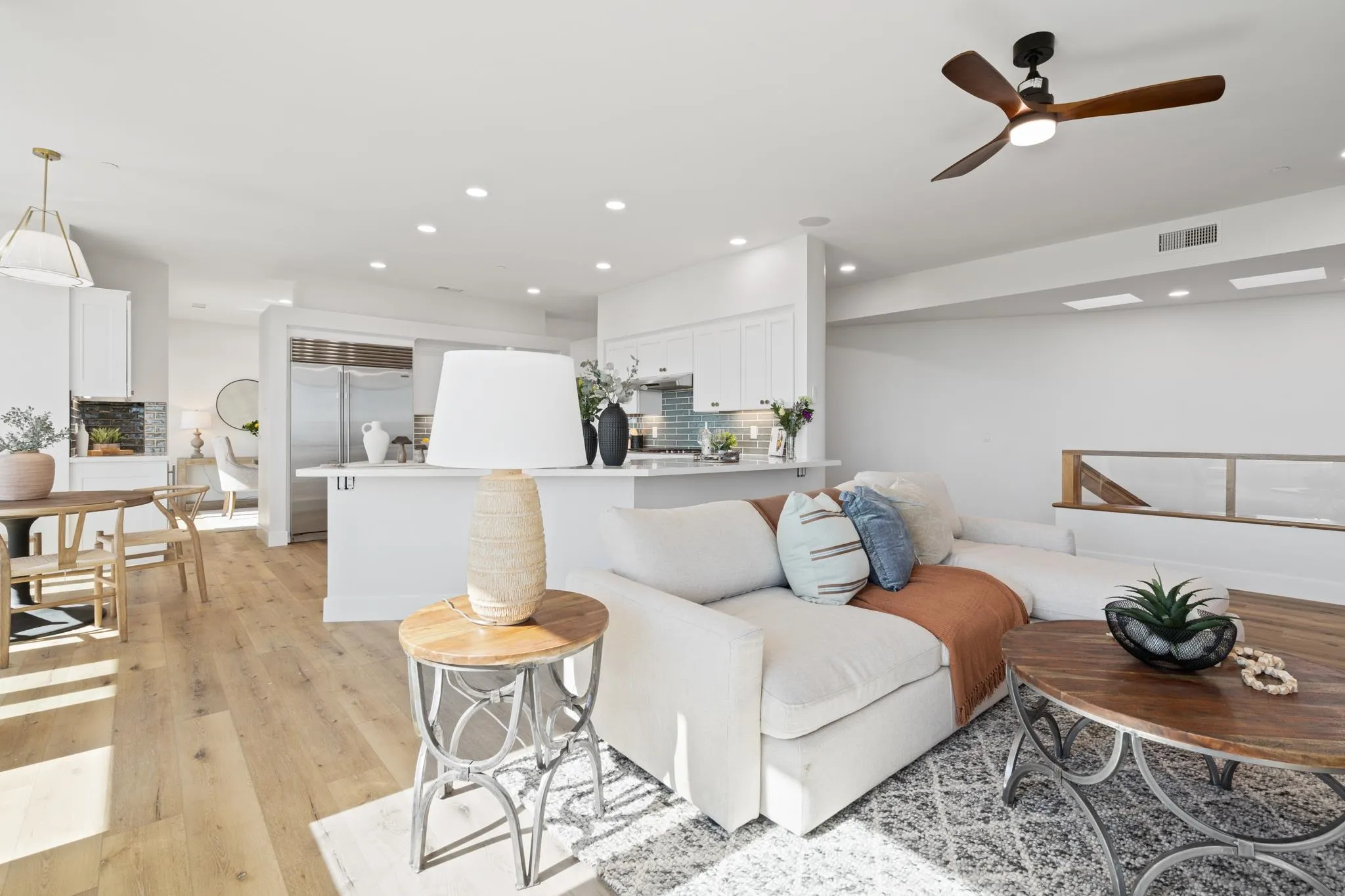 15486 Markar Road Poway, CA 92064 - Photo 14 of 63 a living room with furniture and kitchen view