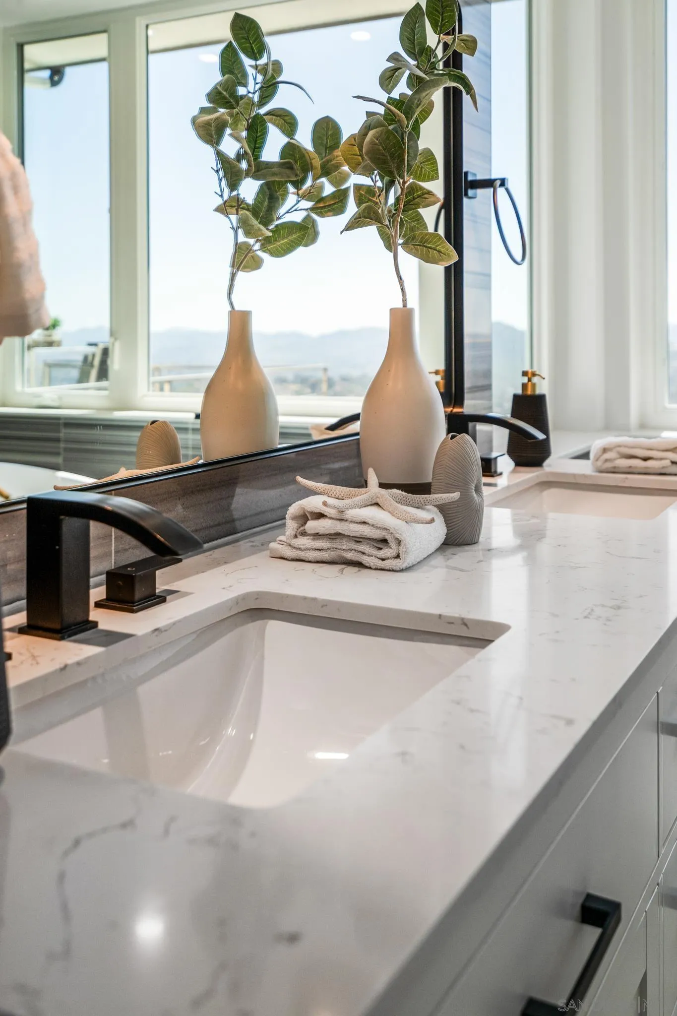 15486 Markar Road Poway, CA 92064 - Photo 16 of 63 a vase of flowers sitting on a table