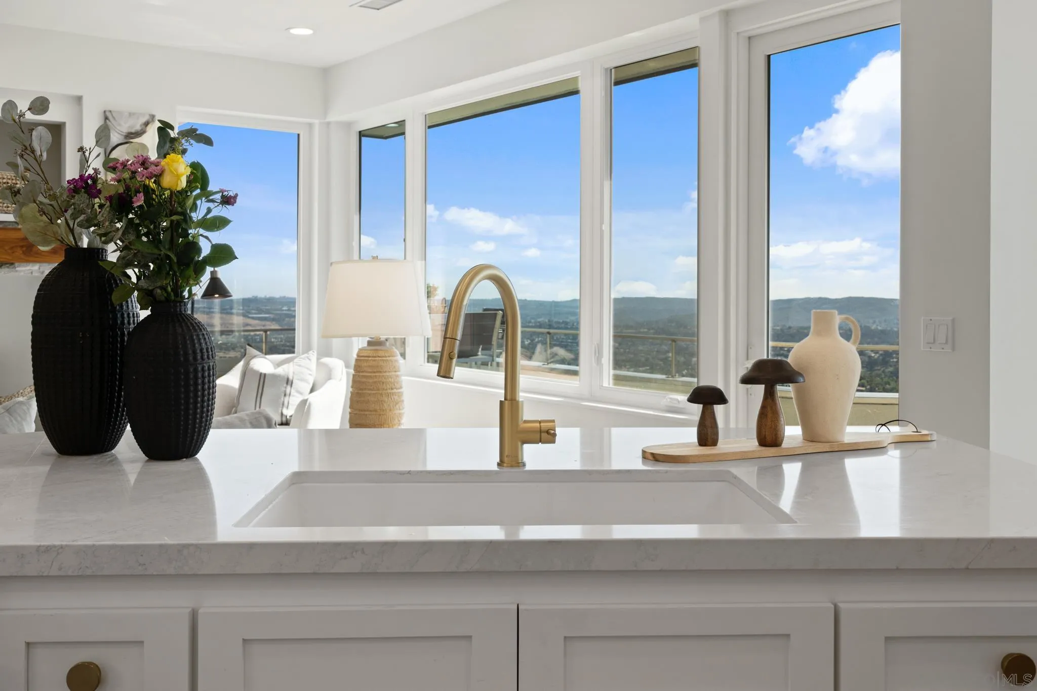 15486 Markar Road Poway, CA 92064 - Photo 18 of 63 a view of a living room with a potted plant
