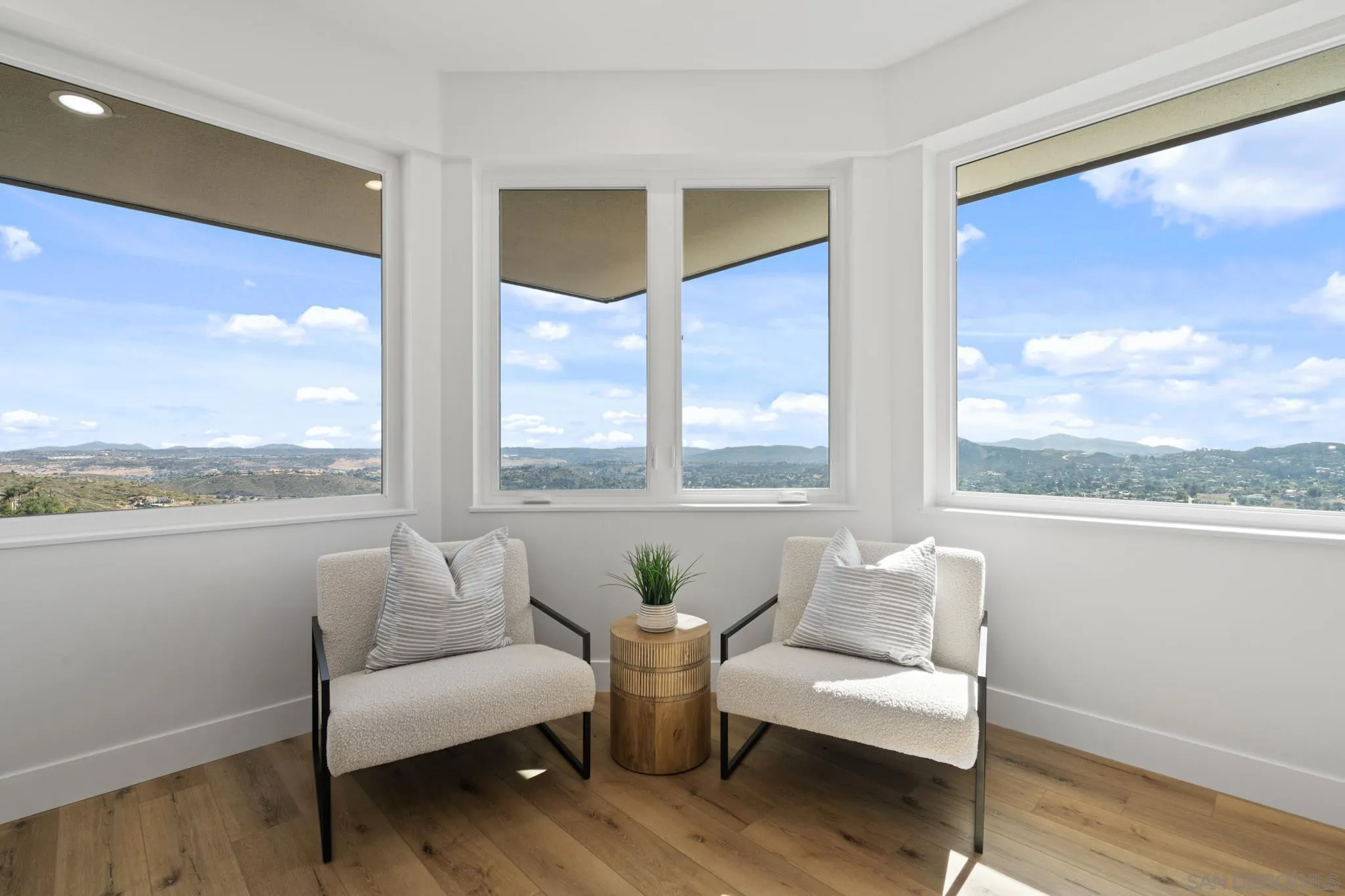 15486 Markar Road Poway, CA 92064 - Photo 20 of 63 a living room with furniture and a floor to ceiling window
