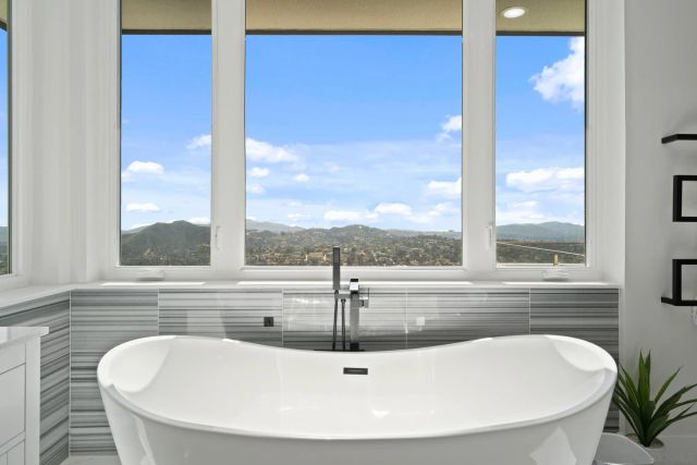 a view of a balcony with chairs