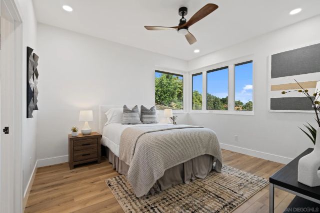 a view of a balcony with mountain view and wooden floor