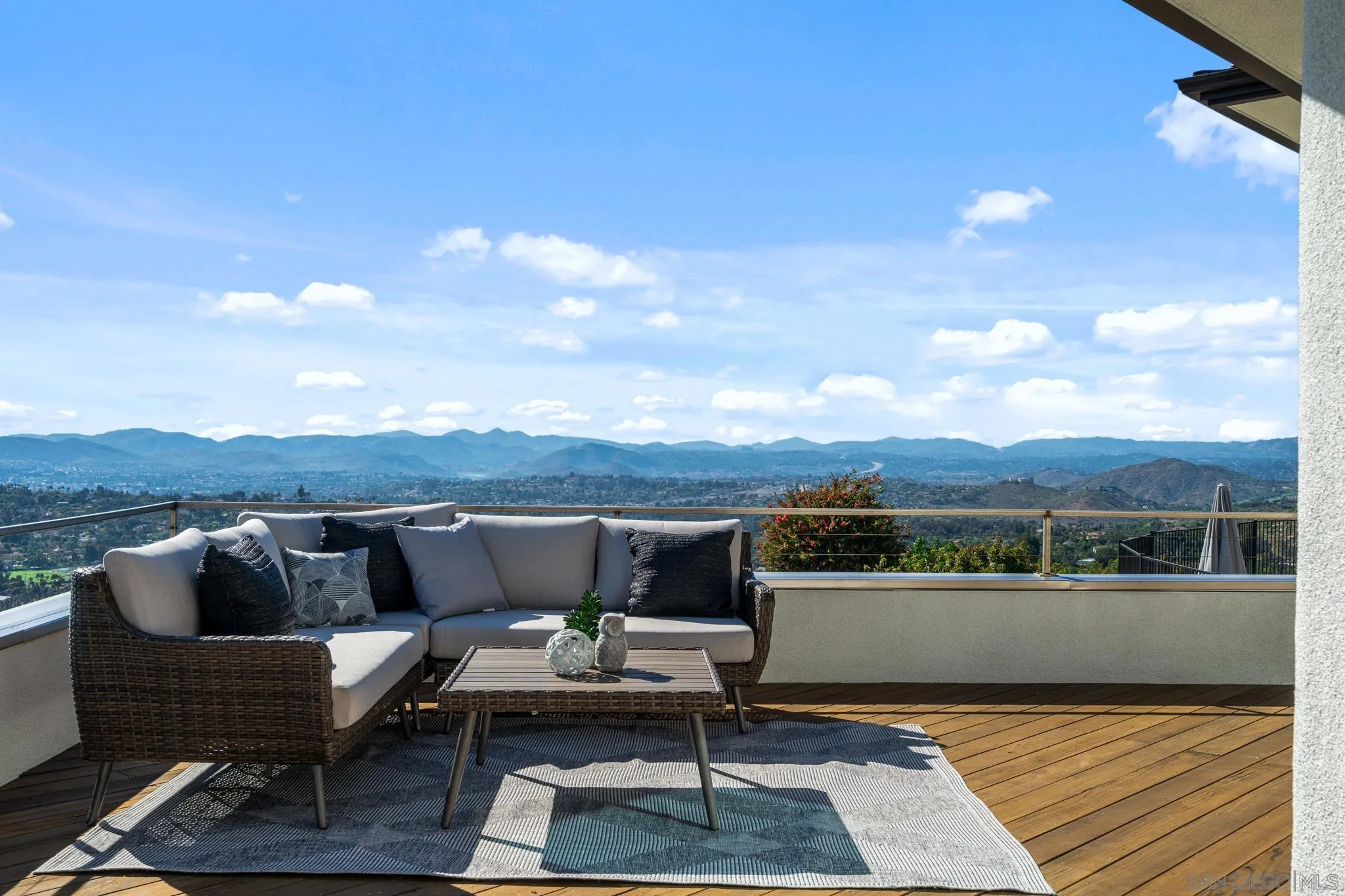 15486 Markar Road Poway, CA 92064 - Photo 28 of 63 a view of a terrace with couches and sky view