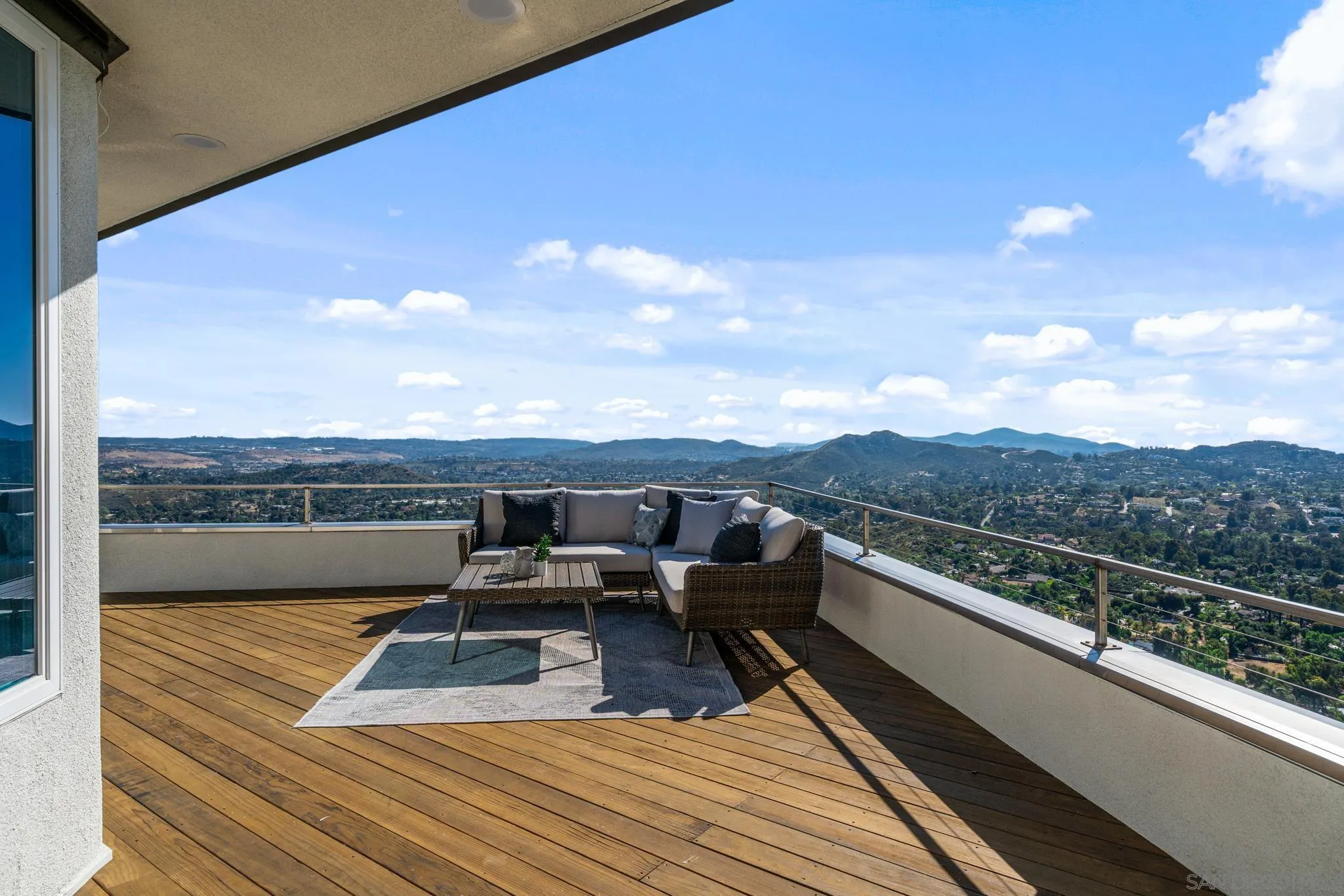 15486 Markar Road Poway, CA 92064 - Photo 30 of 63 a view of a balcony with chairs