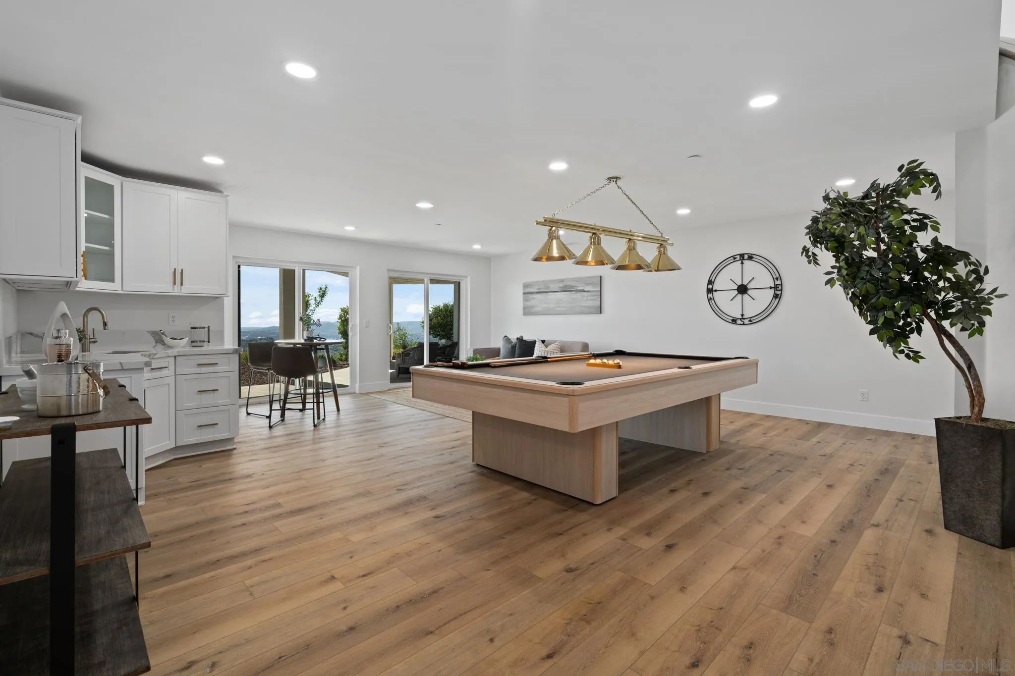 15486 Markar Road Poway, CA 92064 - Photo 33 of 63 a living room with furniture and wooden floor