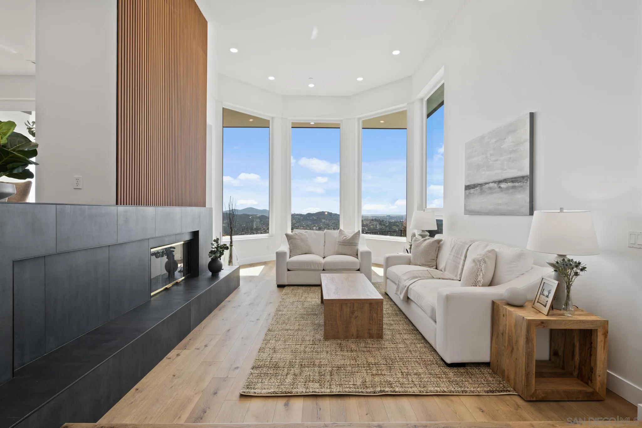 15486 Markar Road Poway, CA 92064 - Photo 55 of 63 a living room with furniture and large windows