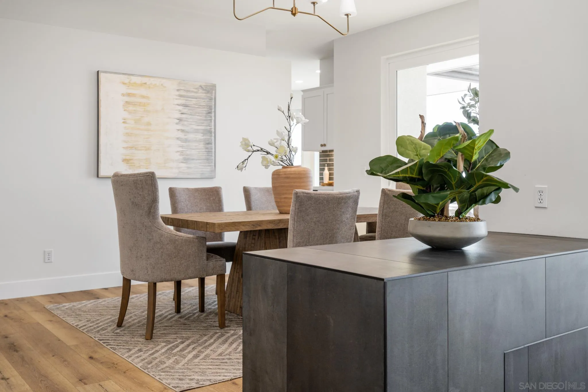 15486 Markar Road Poway, CA 92064 - Photo 6 of 63 a dining room with furniture and wooden floor