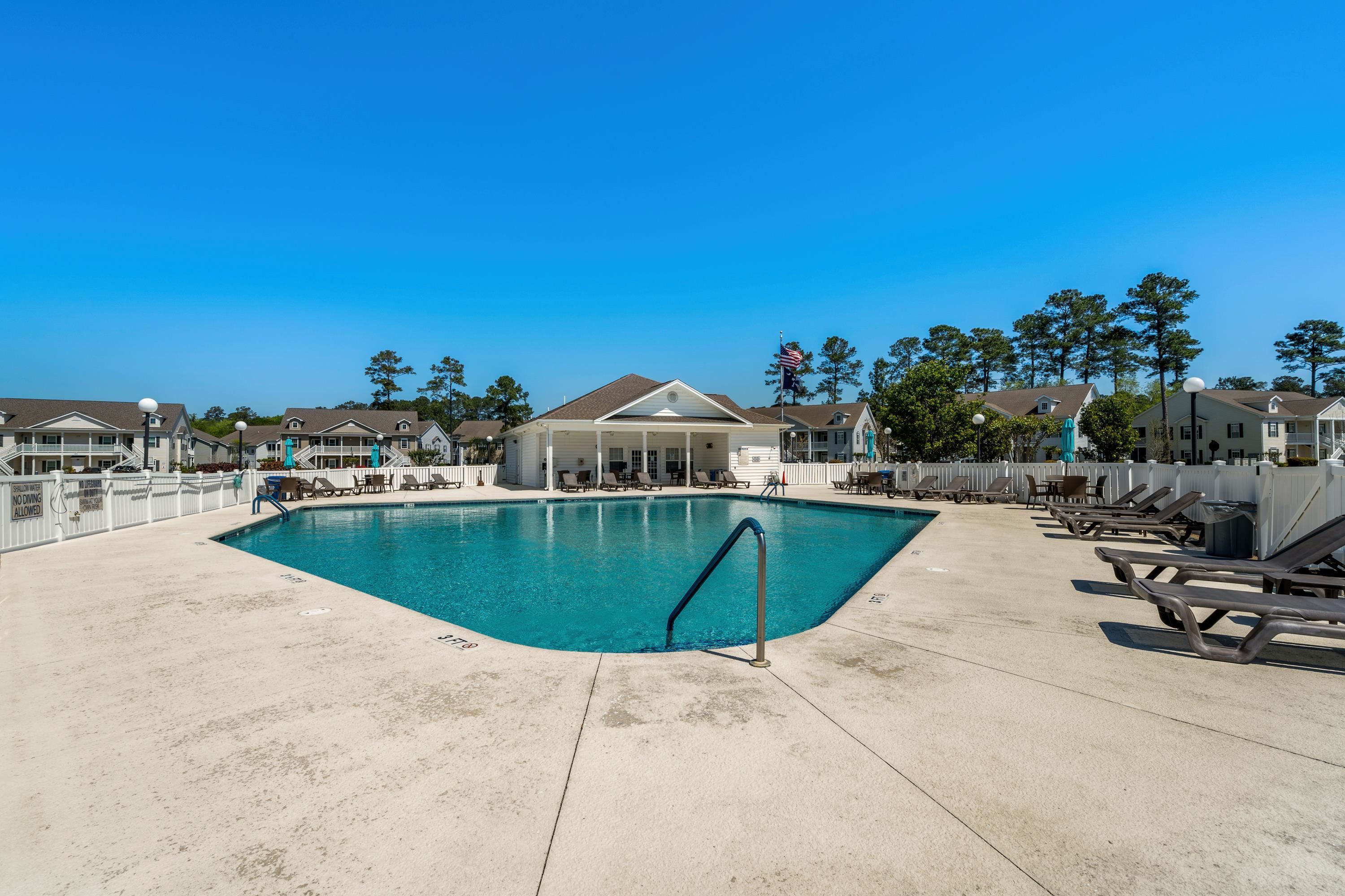 948 Jackline Place, Unit 201 Murrells Inlet, SC 29576 - Photo 30 of 37 Community pool with a patio and a residential view