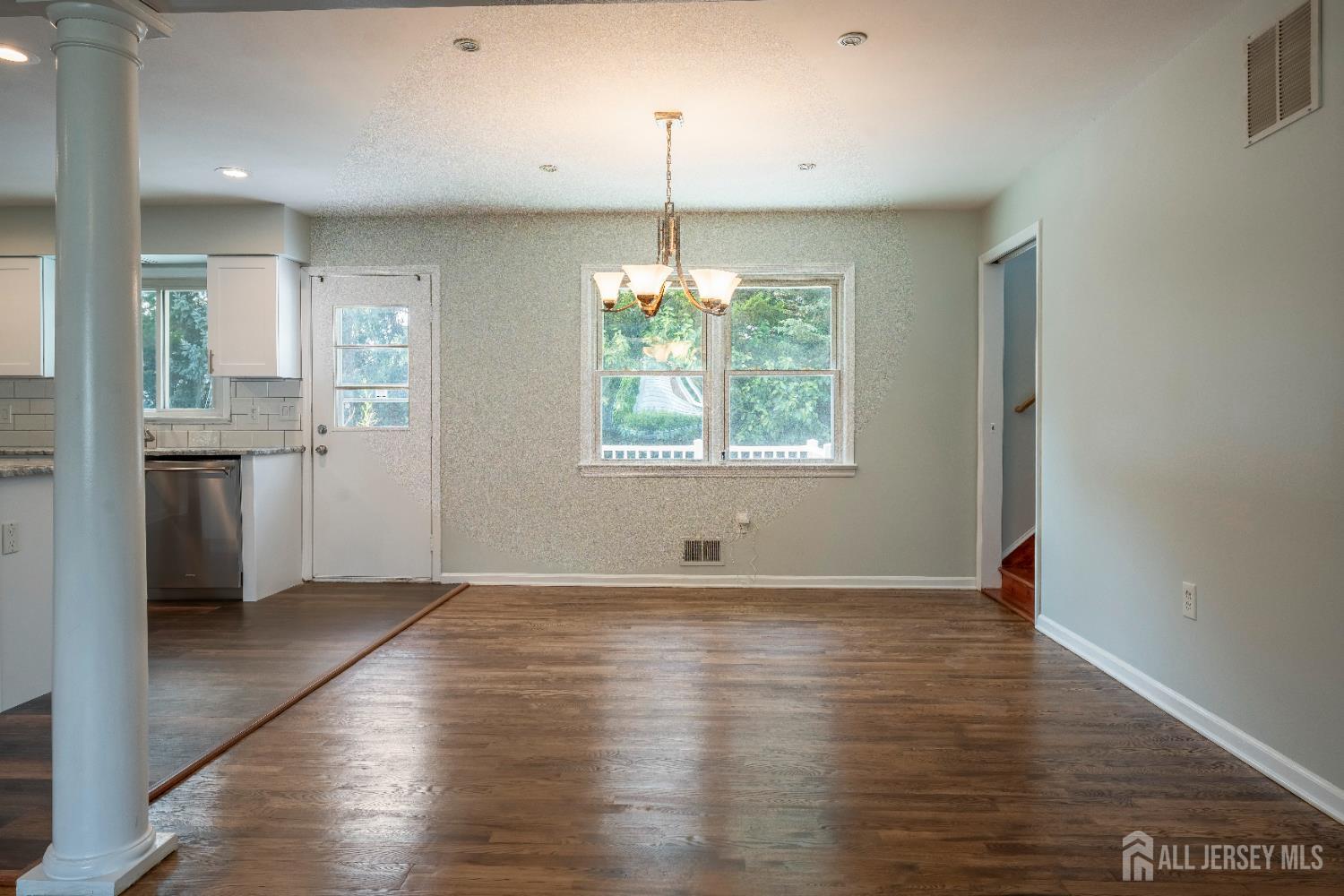 5 Estok Road Edison, NJ 08817 - Photo 9 of 40 a view of a kitchen with wooden floor and a window