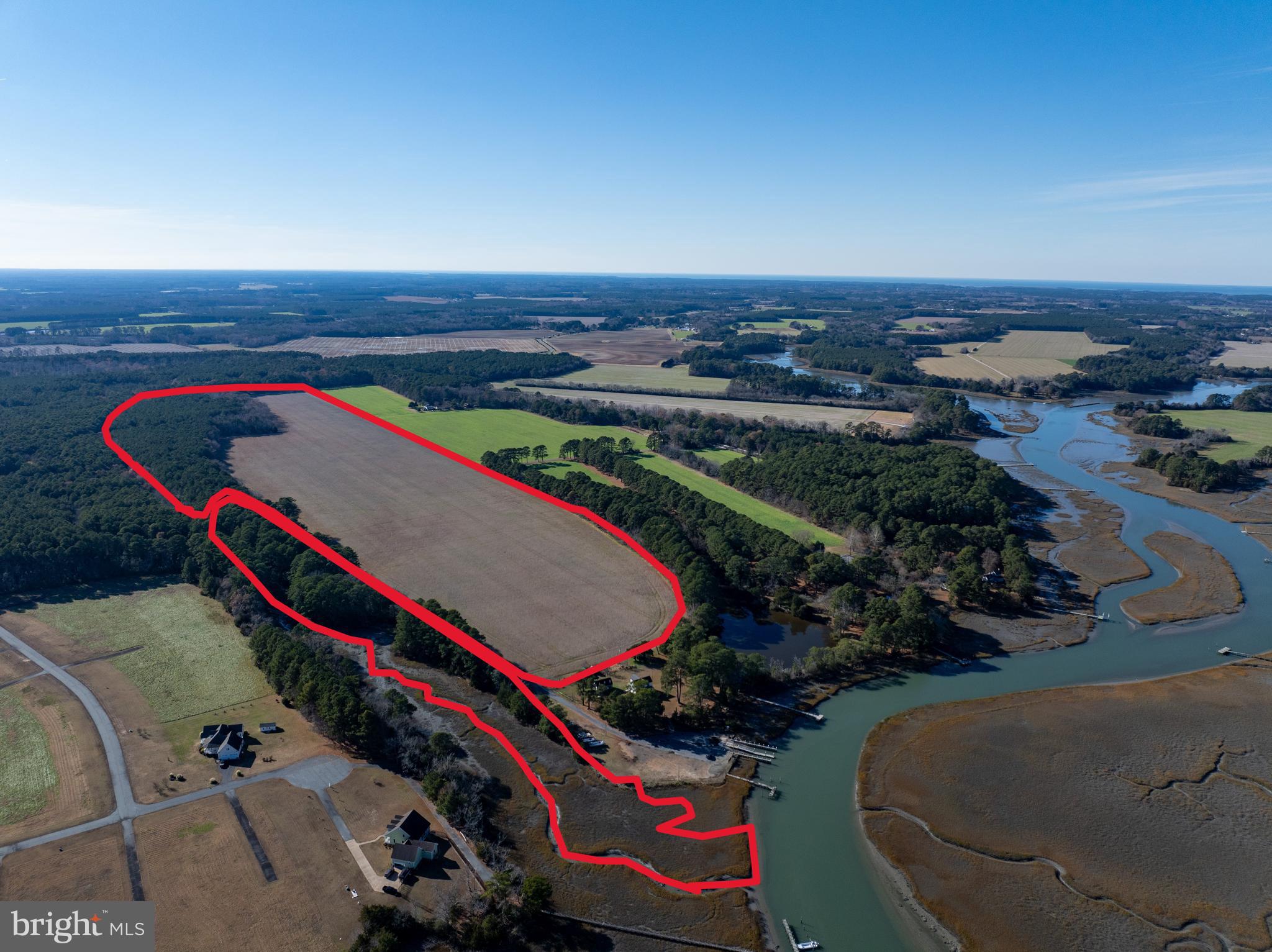 Folly Creek Road Accomac, VA 23301 - Photo 2 of 15 an aerial view of a pool and chairs