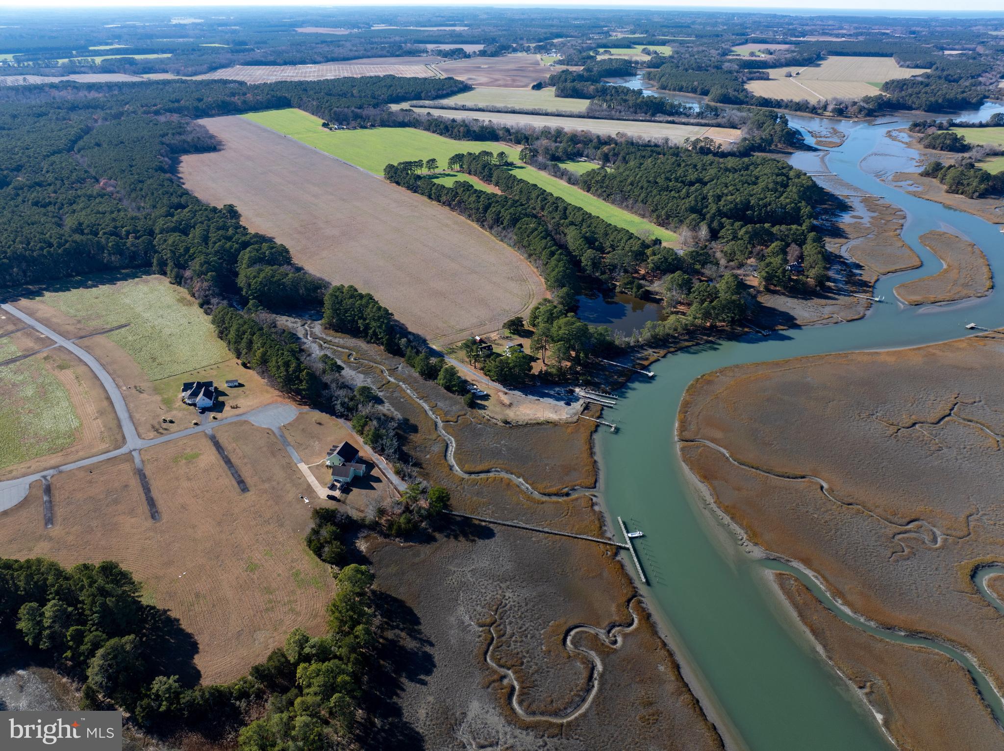 Folly Creek Road Accomac, VA 23301 - Photo 3 of 15 an aerial view of a house with a yard
