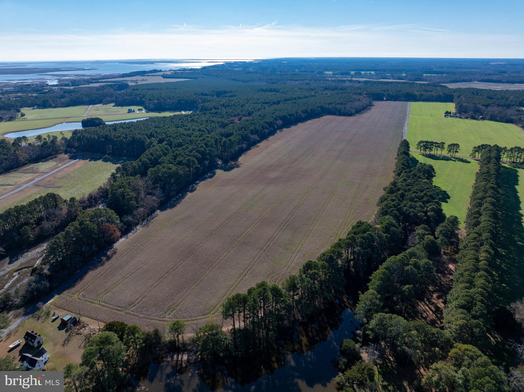 Folly Creek Road Accomac, VA 23301 - Photo 6 of 15 an aerial view of a house with a garden