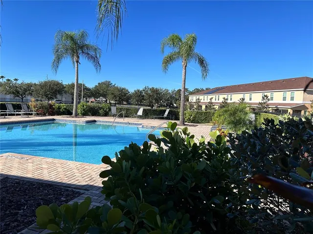 a view of a street in front of a house