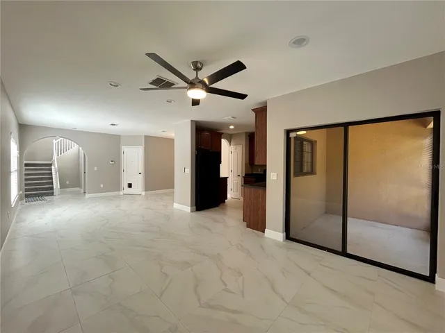 a view of a livingroom with a staircase