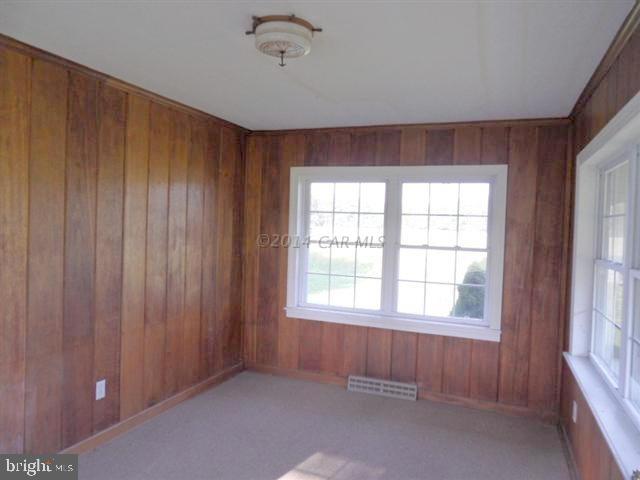 3388 Whitehaven Road Tyaskin, MD 21865 - Photo 4 of 13 a view of an empty room with a window