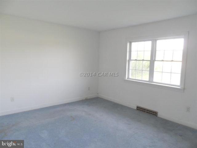 3388 Whitehaven Road Tyaskin, MD 21865 - Photo 9 of 13 an empty room with a window