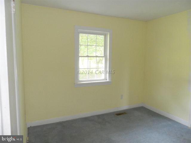 3388 Whitehaven Road Tyaskin, MD 21865 - Photo 10 of 13 an empty room with a window