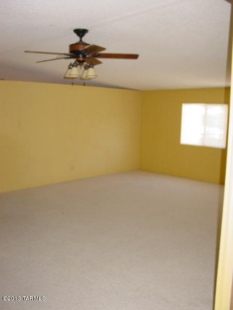 5201 North Lak A Yucca Road Tucson, AZ 85743 - Photo 11 of 19 a view of a water heater and a floor to ceiling window
