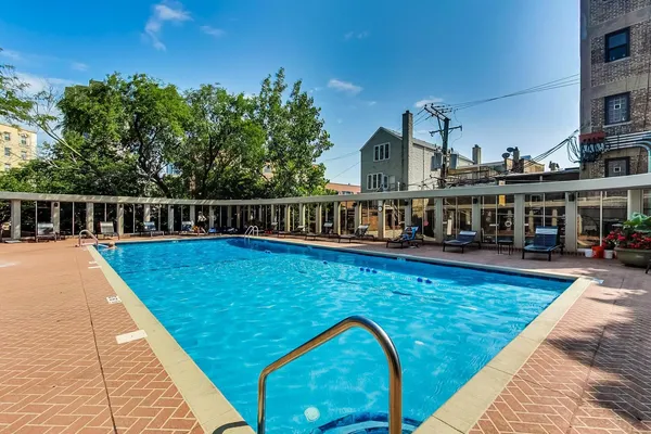 a view of a house with swimming pool