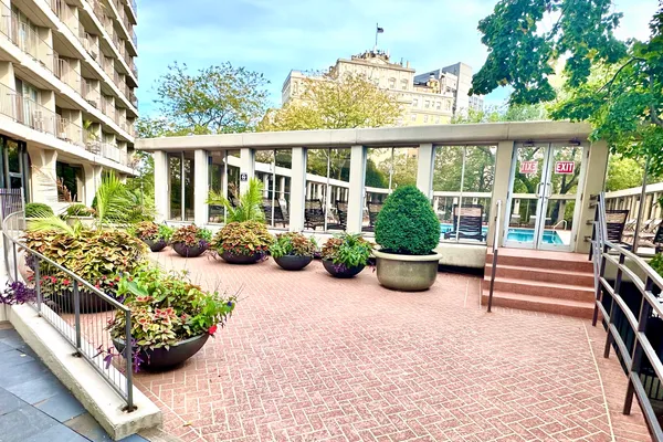 a view of a chairs and table in a patio