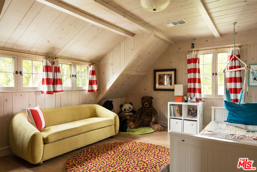 San Antonio Street Ojai, CA 93023 - Photo 26 of 73 a living room with furniture a flat screen tv and a table
