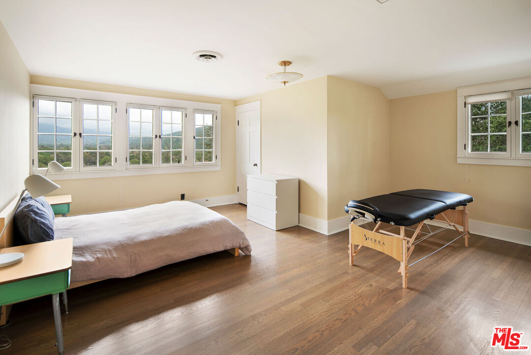 San Antonio Street Ojai, CA 93023 - Photo 49 of 73 a bedroom with a bed window and a table