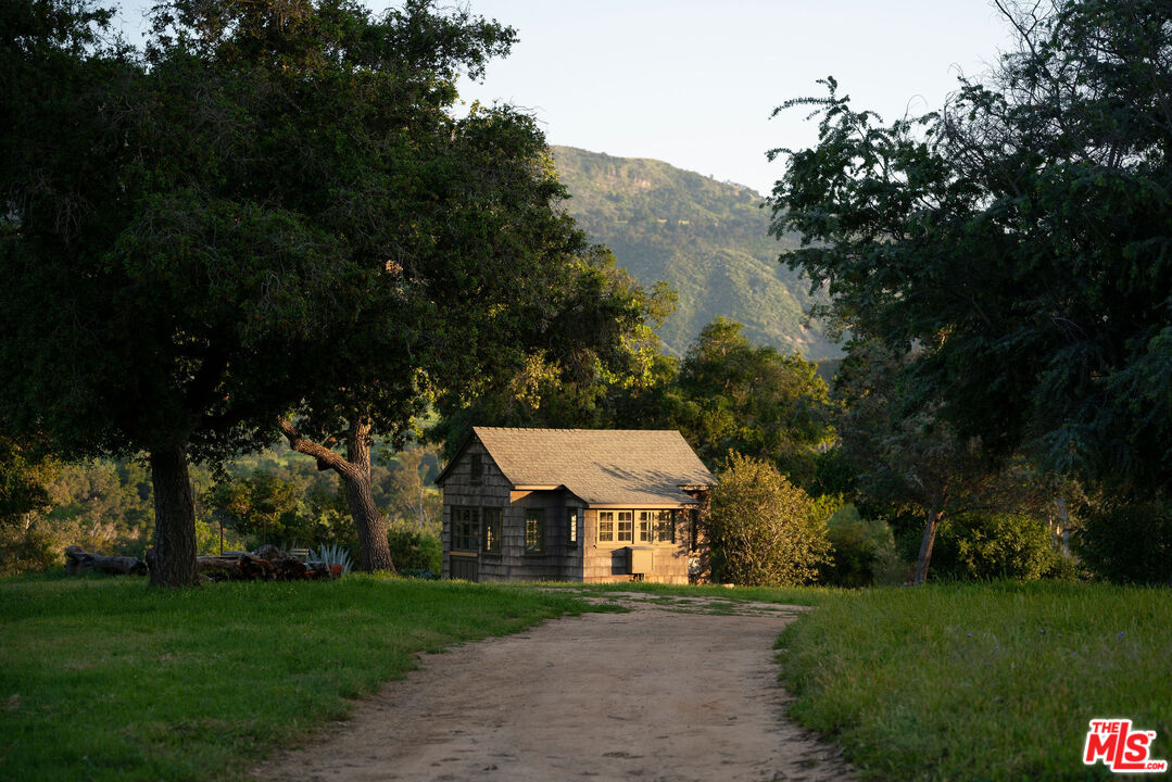 San Antonio Street Ojai, CA 93023 - Photo 52 of 73 a view of a big house with a big yard and large trees