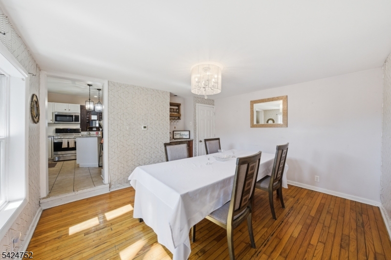 1401 Mt Holly Road Burlington, NJ 08016 - Photo 7 of 23 a view of a dining room with furniture and wooden floor