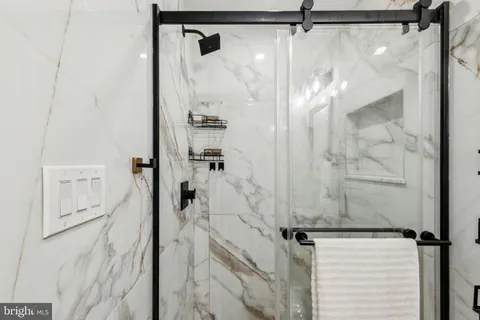 a bathroom with a sink and mirror