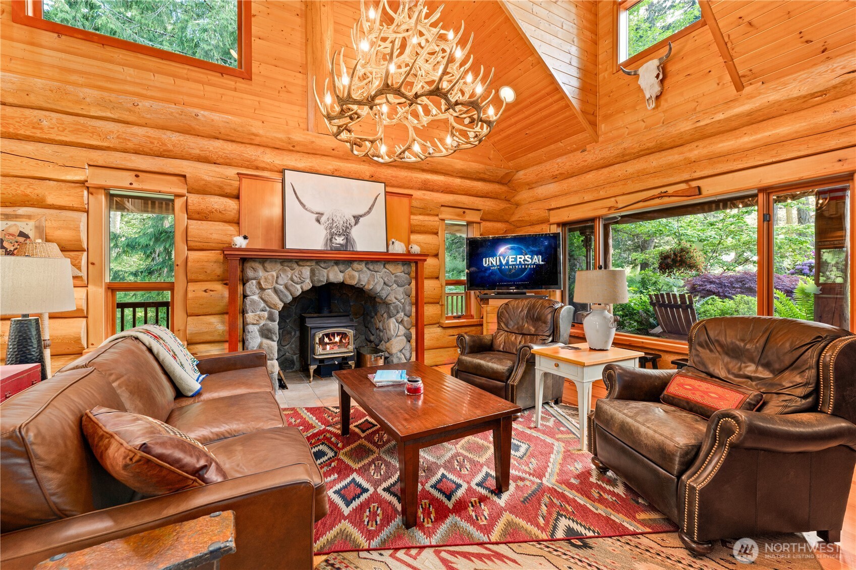 134 Sacred Moon Way Friday Harbor, WA 98250 - Photo 10 of 35 a outdoor living space with patio furniture and a fireplace
