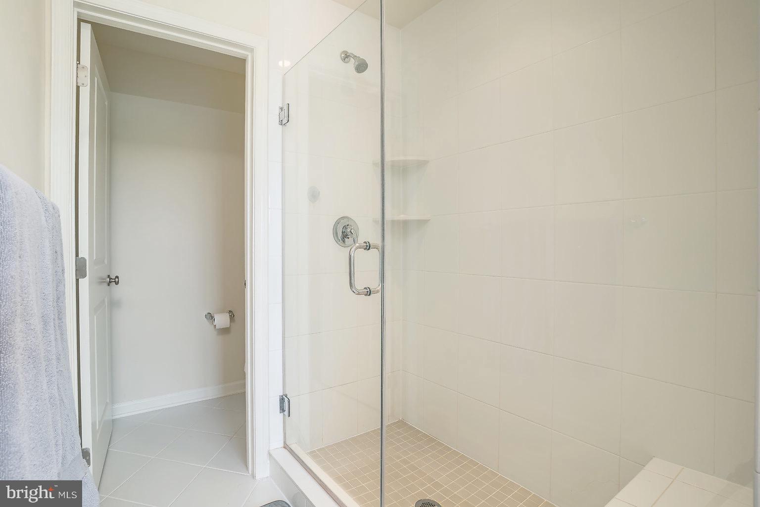 320 Spruce Pine Road Abingdon, MD 21009 - Photo 24 of 37 Fully tiled shower with bench and seamless glass
