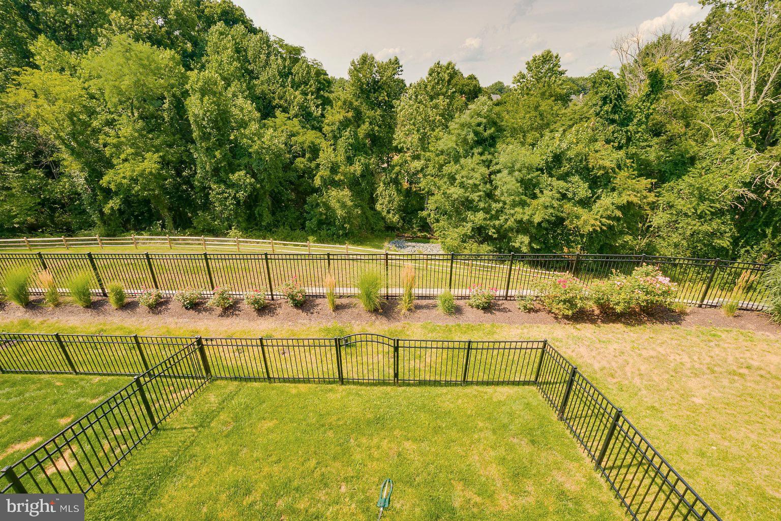 320 Spruce Pine Road Abingdon, MD 21009 - Photo 35 of 37 Backyard and tree lined views from the deck