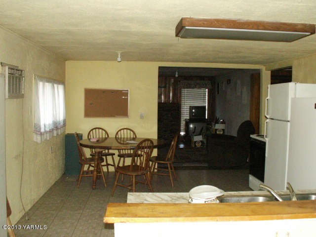 211 Ranger Road Naches, WA 98937 - Photo 7 of 16 a view of a dining room with furniture