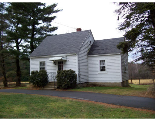 66 Groton School Road Ayer, MA 01432 - Photo 1 of 3 a view of a house with a yard