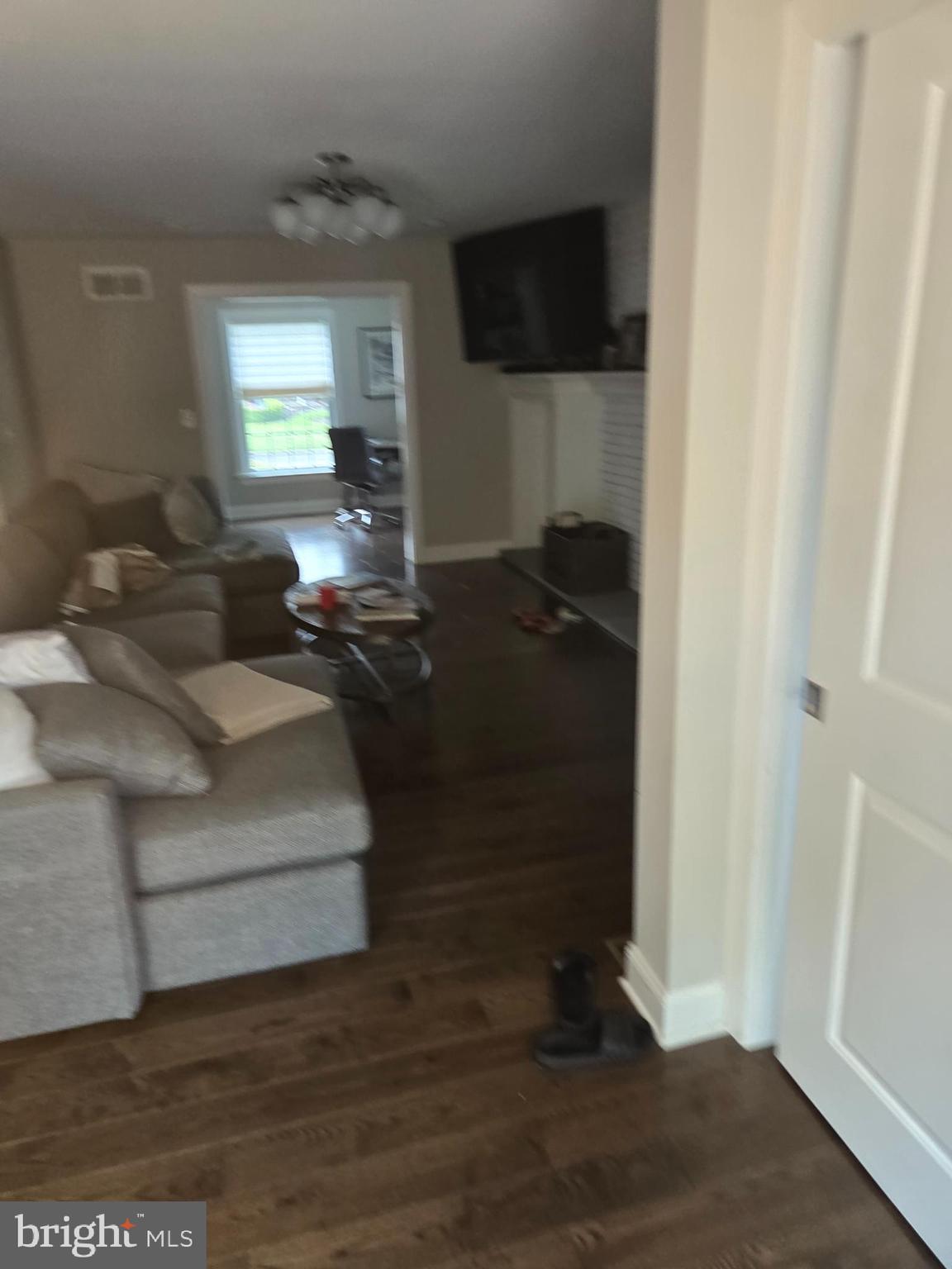 145 East Golf View Road Ardmore, PA 19003 - Photo 20 of 103 a living room with furniture and a flat screen tv