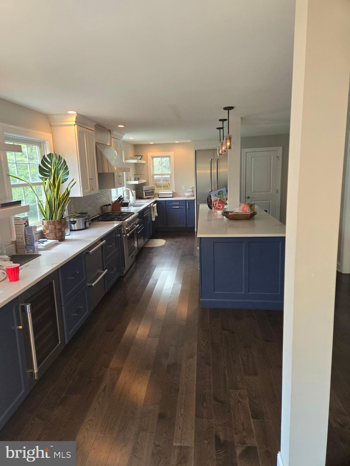 145 East Golf View Road Ardmore, PA 19003 - Photo 27 of 103 a kitchen with counter top space and wooden floor