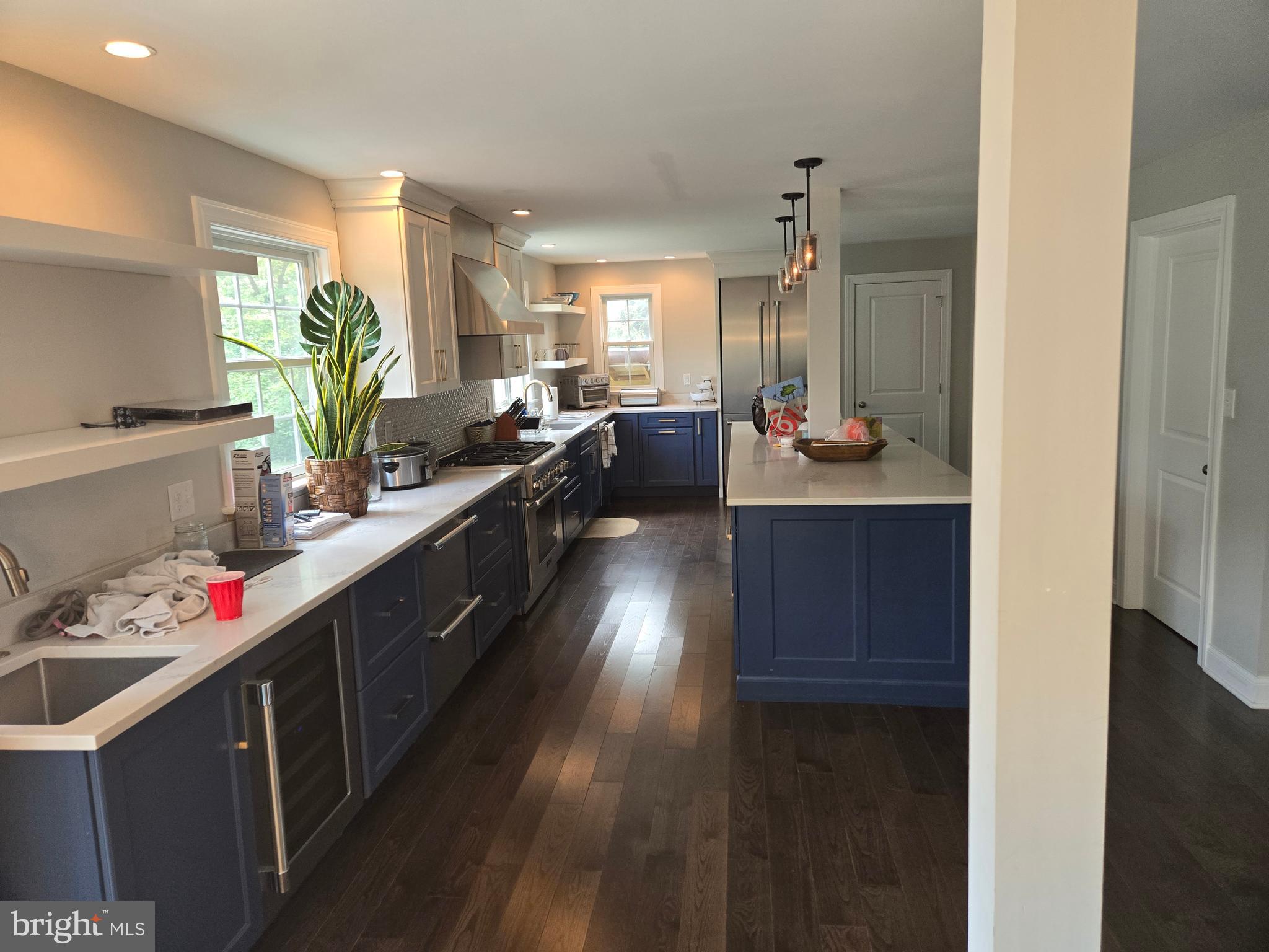 145 East Golf View Road Ardmore, PA 19003 - Photo 28 of 103 a kitchen with sink and cabinets