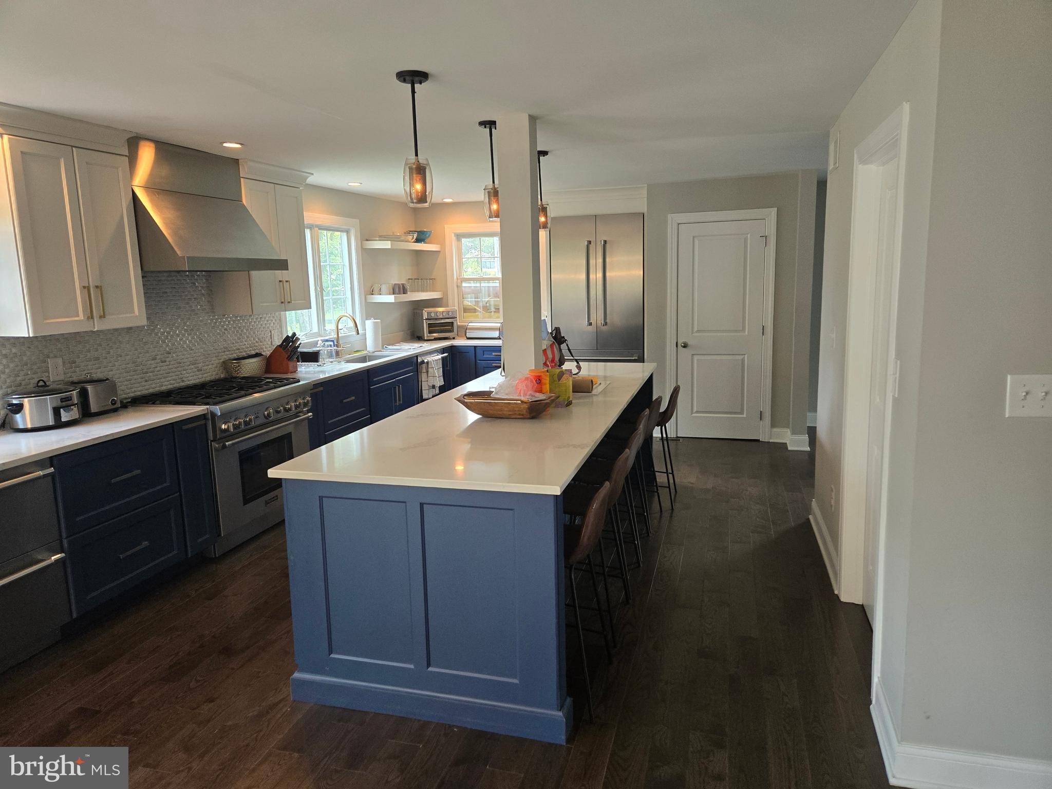 145 East Golf View Road Ardmore, PA 19003 - Photo 31 of 103 a kitchen with a sink stove and cabinets
